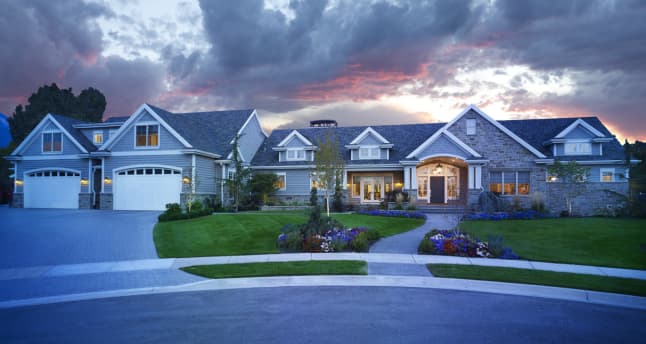 Luxury custom home with asphalt shingles